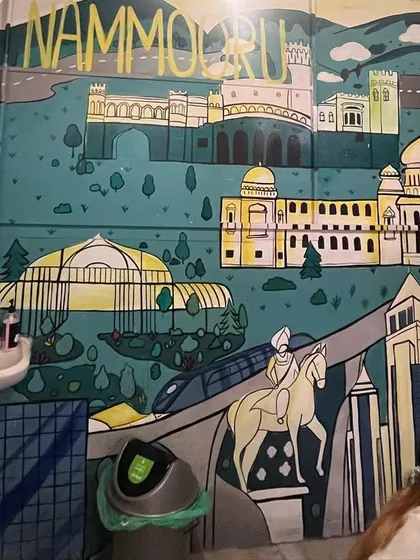 A "Namma Bengaluru" themed wall painting for a local cafe. The mural is a collage of Bangalore's famous landmarks, celebrating the spirit of the city.