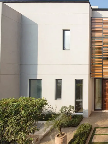 The Equilibrium Houses in New Delhi are an exercise in minimalism and light. The clean lines and large glass doors invite natural light to flood the interiors, creating a sense of openness and transparency.