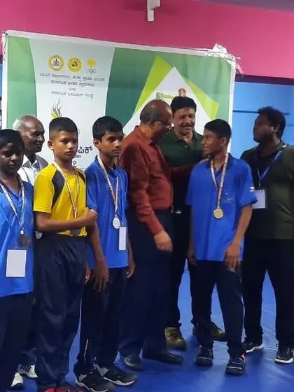 Students from our academy receiving their medals. We focus on proper technique and sportsmanship, which leads to results like this.