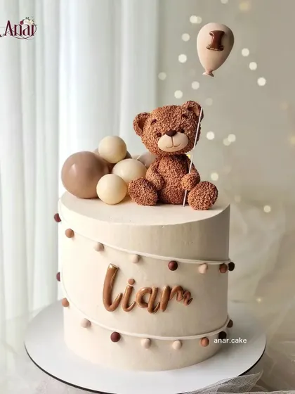 A cute, aesthetic, and pretty pastel teddy bear themed cake for a first birthday.