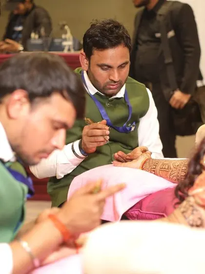 Teamwork makes the dream work. We coordinate to ensure a smooth and enjoyable mehandi experience for everyone.
