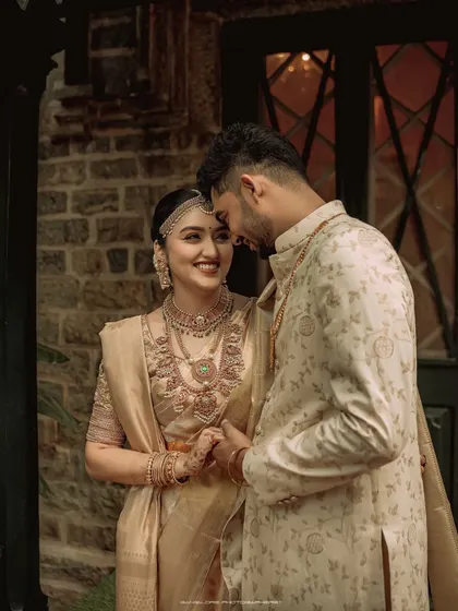 Against a timeless stone backdrop, the couple shares a look of deep understanding and affection. I seek out these classic, elegant compositions that feel both grand and personal.