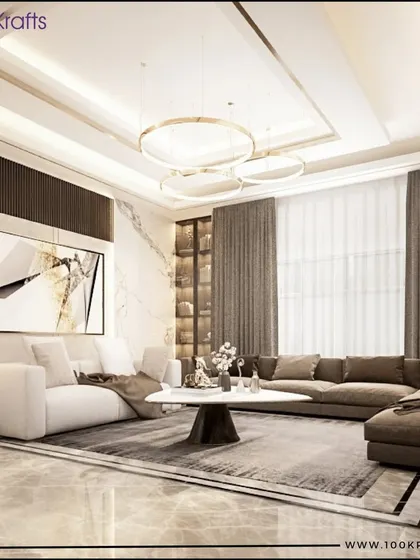 This expansive living room uses a large L-shaped sofa to define the seating area. The design combines a marble feature wall, a modern floor lamp, and a large area rug to create a cohesive and elegant look.
