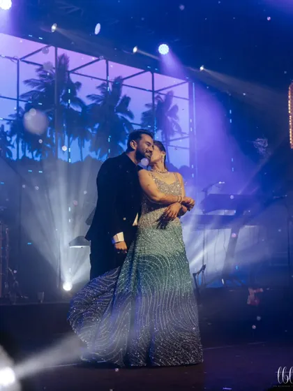 A romantic moment captured during the couple's sangeet performance. We focus on creating these small, intimate moments within the larger choreography that truly showcase their love.