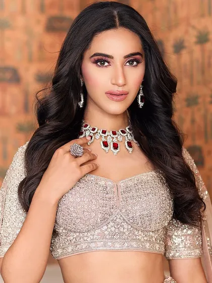 Another angle of the client, her ruby necklace and soft glam makeup creating a stunning combination.
