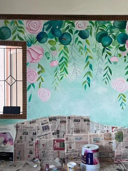 A hanging floral theme mural designed for the space behind a headboard. I used a color wash technique for the background and a watercolor effect for the flowers to create a soft, dreamy look.