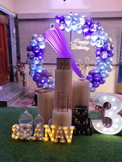 A full view of the at-home birthday decoration for Shanav, showing how it fits perfectly in the space.