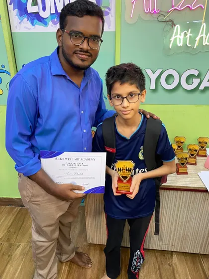 Second place winner Manit Bhansali receives his award. The final matches were incredibly exciting to watch.