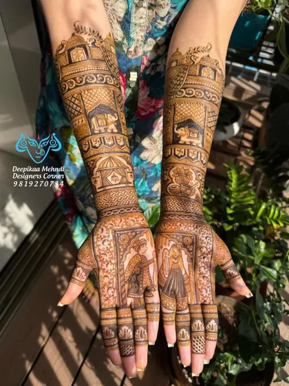 A clear, sun-kissed shot of a full story-based mehndi. This design includes bride and groom portraits, a doli scene, and palace architecture, covering the hands and arms in a beautiful narrative.