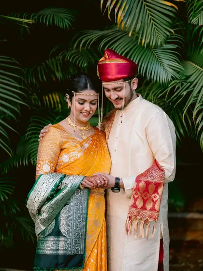 A sweet portrait of the couple, their traditional mundavalya adding to the authenticity of the moment.