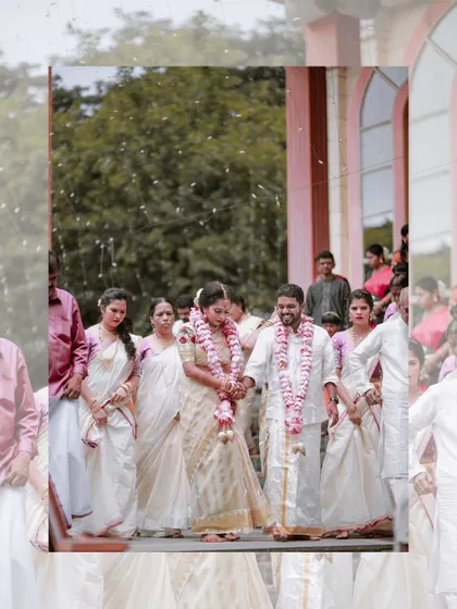 The couple makes their way through a shower of petals, a beautiful and celebratory moment from their wedding procession.