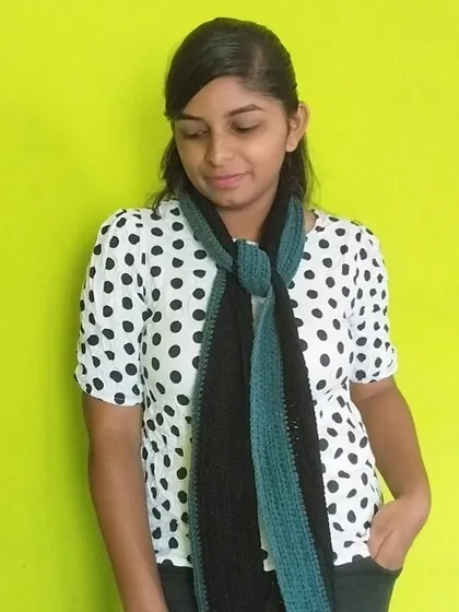 Another way to style the crochet muffler, tied in a simple knot.