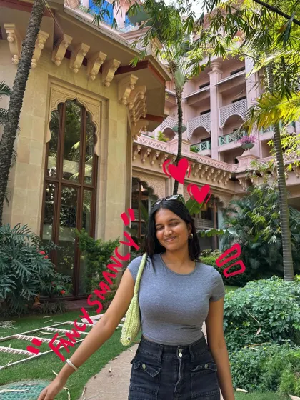 Fancy shmancy. A photo in a beautiful hotel courtyard, with a fun text doodle.