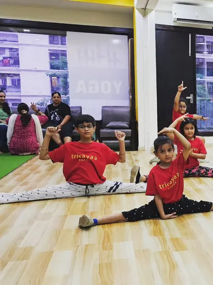 Kids in our Bollywood and jazz class showing off their flexibility and energy. We create a space for them to have fun while learning.