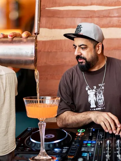 It's a multi-sensory experience. I'm not just mixing beats, I'm mixing cocktails and curating the entire vibe for the night.