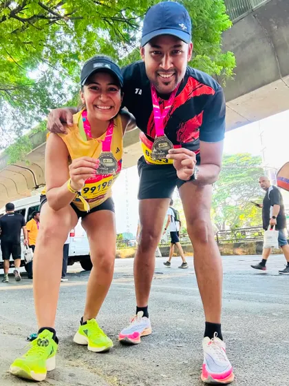 A duplicate of image 57. Posing with a friend and fellow runner after the TCS10K. The running community is all about celebrating each other's achievements.