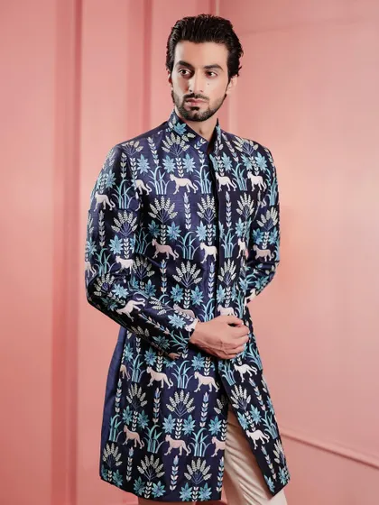 The side view of our printed Indo-Western jacket reveals its sleek, tailored fit. The pattern is a contemporary take on traditional motifs, perfect for the modern man.