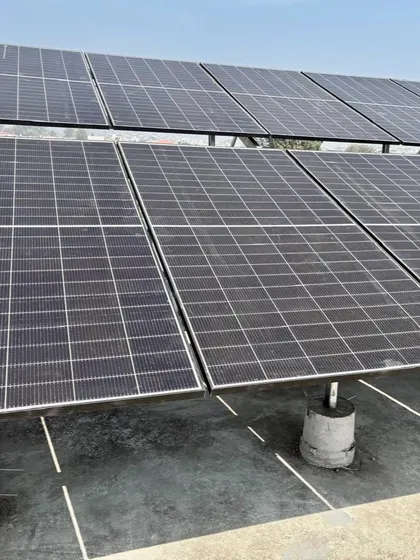 A close-up of the solar panels installed for a 5kW hybrid system in Haldwani, Nainital. Our panels are built to withstand diverse weather conditions, from intense sun to cloudy days.