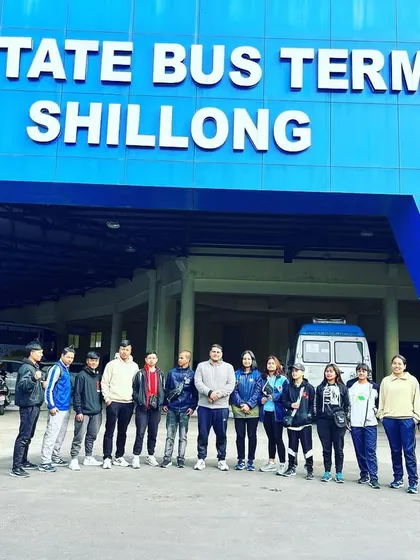 The team at the Shillong bus terminus, ready to travel for the All India Inter SAI Karate Championship. The journey to a competition starts long before we step on the mat.