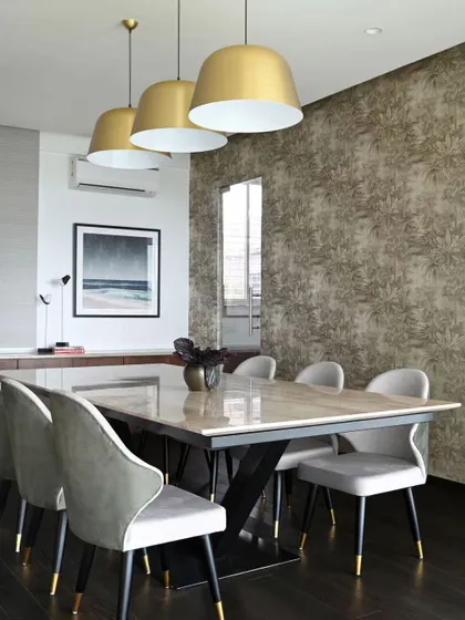 The private dining hall in a corporate office, designed for hosting dignitaries. A botanical-print wallpaper, brass pendant lights, and plush velvet chairs create an elegant and comfortable dining experience.