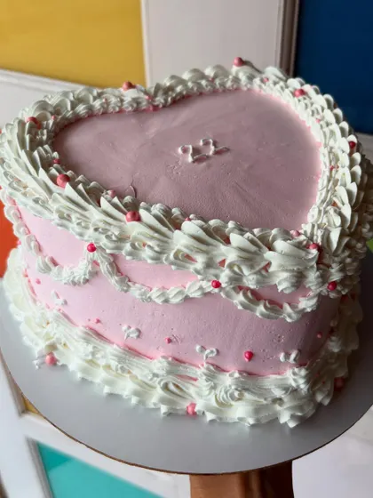 A side view of the vintage heart cake, showing the layers of piped frills. This one was for a 22nd birthday.