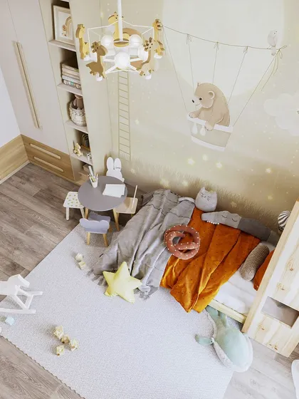 An overhead view showcasing the efficient layout of this playful and organized children's bedroom.