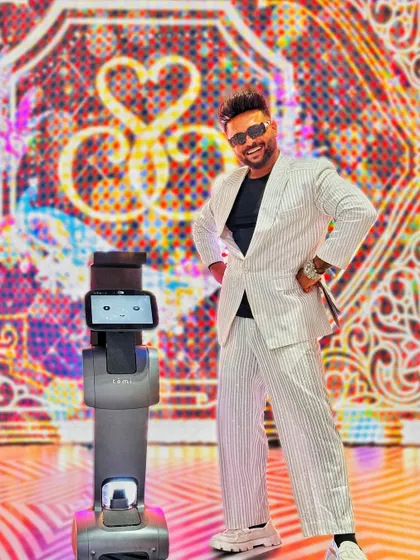 Me and Jairo, ready to rock the Sangeet stage. A fusion of human energy and futuristic tech.