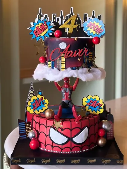 Avengers, assemble! Our superhero cakes bring the action to your party, featuring characters like Spider-Man, Superman, Batman, and the Hulk on multi-tiered cityscapes.