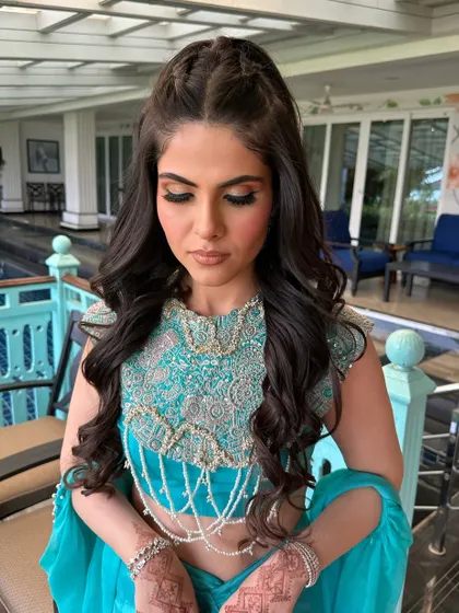 A close-up of the Dutch braids in this elegant half-ponytail.