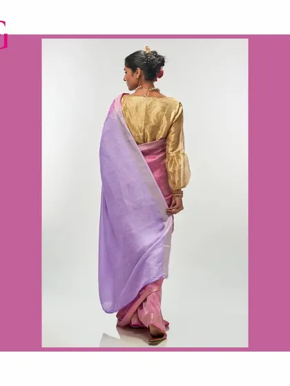 The back of the pink and lavender saree, showing the beautiful fall of the silk linen fabric and the modern blouse pairing.