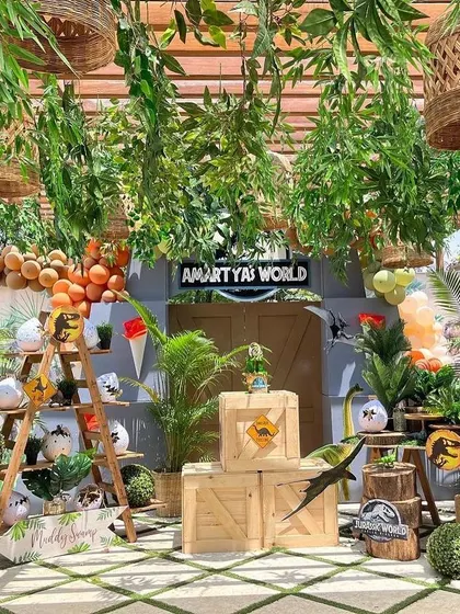 A full view of the Jurassic World birthday setup. I focus on creating a complete environment, from the overhead greenery down to the floor details, for a truly transportive experience.