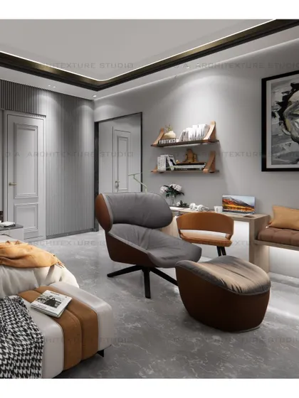 A comfortable lounge chair and ottoman provide a perfect corner for reading or relaxing in this spacious bedroom.