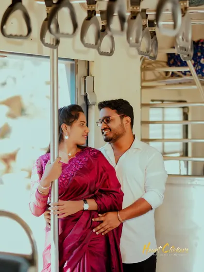 A creative pre-wedding shot on a train. Using everyday locations can lead to unique and memorable engagement photos.