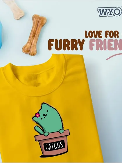 A duplicate of image 40, the adorable "Catcus" design on a bright yellow tee.