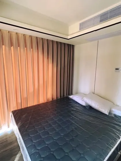 A bedroom in our Space Capsule E8, set up in a seaside location in Bulgaria. The design is clean and simple, ensuring the focus remains on the beautiful view outside.