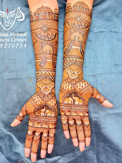 This is the front view of a traditional bridal design, showing the full composition from palms to forearms. The design is rich with elephants, palaces, and doli motifs.