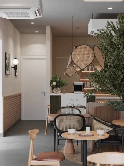 This perspective shows the depth of the cafe and the thoughtful circulation path we designed. The eye is drawn from the foreground seating, past the central tree, towards the service counter in the back, creating a clear and intuitive flow.