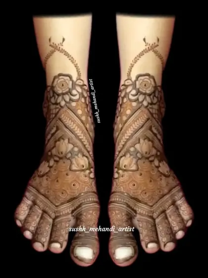 A delicate and graceful foot design with floral and vine patterns climbing up the ankle. This style is both modern and elegant.