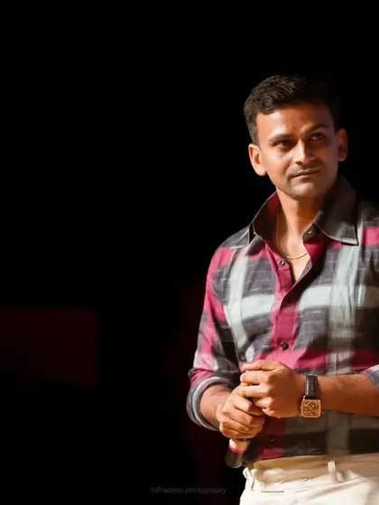A candid portrait of actor Dhananjaya. Capturing celebrities in a natural, off-guard moment is a skill I bring to event and on-set photography.