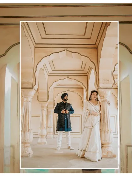 Capturing the essence of a royal Indian wedding, this couple stands amidst the stunning architecture of a Jaipur palace. This is for couples who dream of a heritage wedding filled with elegance.