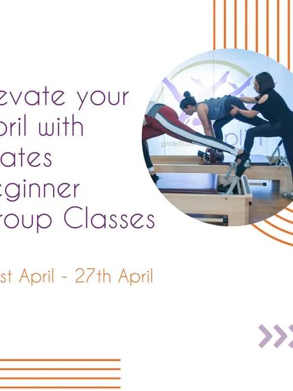 Elevate your month with our Pilates beginner group classes. This image shows an instructor guiding students on the Reformer, highlighting the personalized attention you receive even in a group setting.