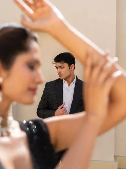 A closer look at the details. We ensure every element, from the texture of the tuxedo to the sparkle of the lehenga, works together.