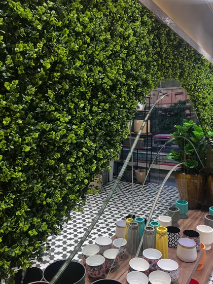 A look at the beautiful artificial boxwood archway in our Surathkal store. It creates a stunning entrance and showcases the quality of our maintenance-free green solutions.