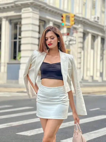 A candid moment crossing the street in New York, feeling the main character energy of the city.