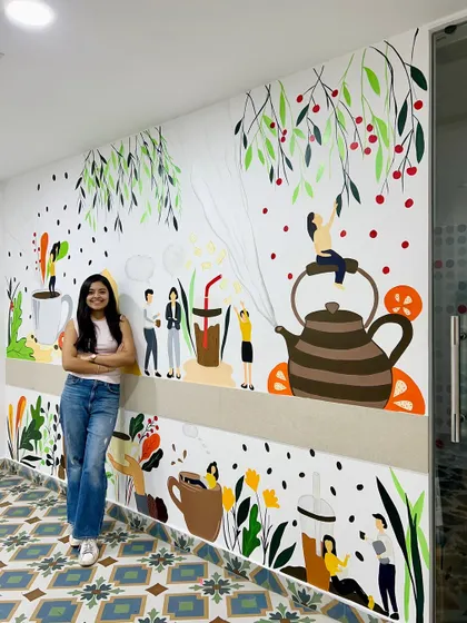 A full view of the second cafeteria mural at Dhruva Advisors. The artwork fills the space with color, stories, and moments that make people smile.