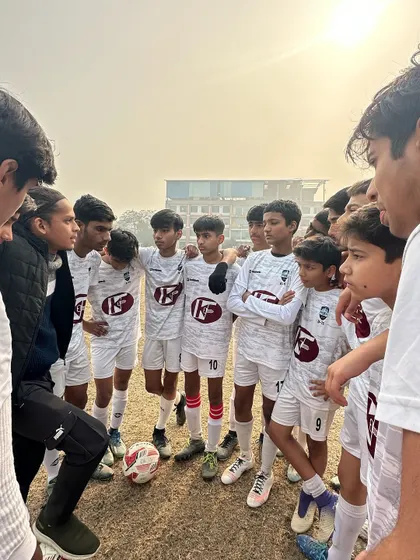 A pre-game huddle where our coach gives final instructions. We ensure our players are tactically prepared and mentally focused for every match.