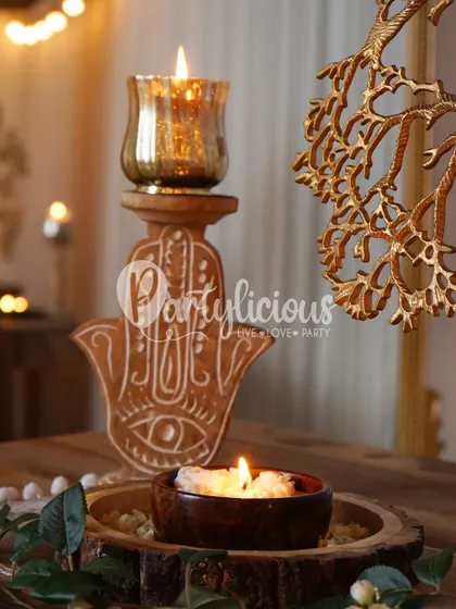 A closer look at the details that make a setup special. This Hamsa hand candle holder not only adds a beautiful, traditional touch but also symbolizes protection and blessings for your home.
