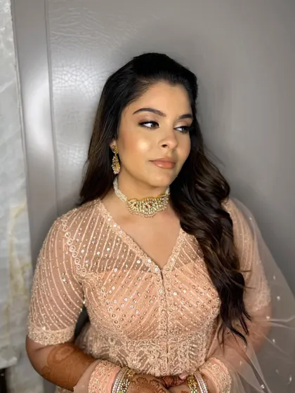 Simran looks effortlessly chic and ready for her engagement celebration. The makeup is understated yet glamorous.