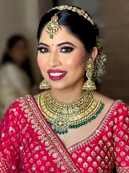 A close-up of this stunning bride. Her heavy Kundan choker, matching jhumkas, and matha patti are all from my rental collection.