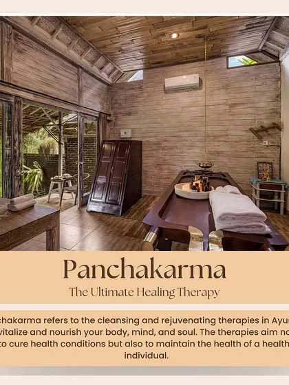A view of one of our serene and private treatment rooms, equipped with a traditional wooden massage table (Droni) and steam box for the ultimate healing therapy.